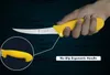 A hand holding a yellow-handled knife with a close-up inset of the handle. Produktbild-Vorschau