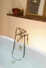 A close-up shot of a bathtub faucet and part of the bathtub. Náhľad obrázku produktu