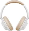 A pair of white and tan over-ear headphones are shown from the front against a white background. Voir les images du produit