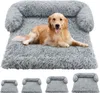 A golden retriever dog lying on a plush gray dog bed. Produktbild-Vorschau