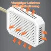 A close-up view of a white heating device with orange arrows indicating airflow and heat. Produktbild-Vorschau