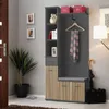 An entryway furniture piece with storage and a bench, decorated with a plant and framed pictures. Produktbild-Vorschau