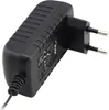 A black power adapter with a European plug. Podgląd zdjęcia produktu
