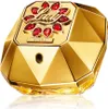 A golden perfume bottle with red jewel-like accents. Voir les images du produit