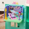 A toy playset featuring a small purple car on a ramp, a traffic light, and a colorful backdrop. Náhľad obrázku produktu