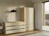 A modern bedroom with a dresser and wardrobe next to a large window. Náhľad obrázku produktu