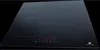 A black induction hob with four cooking zones and a digital control panel, set against a black background. Náhľad obrázku produktu