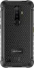 The back of a black Ulefone Armor X8 smartphone with a carbon fiber pattern. Produktbild-Vorschau