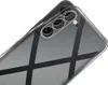 Close-up of the back of a clear phone case with a geometric pattern, showing the camera lenses of a smartphone. Anteprima dell’immagine prodotto