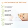 A baby lying on a white surface next to a list of product features. Produktbild-Vorschau