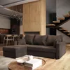 A modern living room with a sectional sofa, fireplace, and staircase. Produktbild-Vorschau
