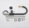 A black kitchen faucet with a flexible hose and various installation parts laid out on a white background. Produktbild-Vorschau