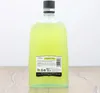 A bottle of Limoncello on a wooden surface with a white background. Anteprima dell’immagine prodotto