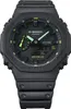 A black Casio G-Shock watch with green accents is shown against a white background. Produktbild-Vorschau