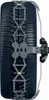 A close-up side view of a car tire with snow chains attached. Produktbild-Vorschau