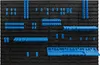 A black pegboard with various blue tool holders and organizers attached. Náhľad obrázku produktu