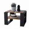 A small table with decorative items on it. Produktbild-Vorschau