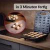A waffle maker with small waffles being made, with a close-up of some finished waffles in a red circle. Náhľad obrázku produktu