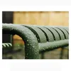 A close-up of a green metal bench or railing covered in water droplets. Produktbild-Vorschau