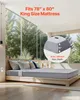 A bedroom with a large window overlooking trees, featuring a bed with a mattress. Podgląd zdjęcia produktu