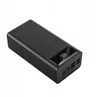 A black power bank with a digital display showing 100% charge, viewed from a 3/4 angle. Produktbild-Vorschau