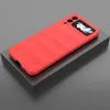A red phone case is displayed on a dark gray platform against a light gray background. Produktbild-Vorschau