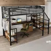 A loft bed with a desk, stairs, and storage shelves, set up in a room. Náhled obrázku produktu