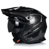A black and gray motorcycle helmet with a visor, shown on a white background. Voir les images du produit