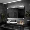 A modern bathroom vanity with a large LED-lit mirror, sink, and accessories. Produktbild-Vorschau
