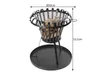 A black metal fire pit with a grill grate and logs inside, shown on a white background with dimensions indicated. Produktbild-Vorschau