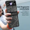 A person is holding a black phone case with a futuristic design. Produktbild-Vorschau