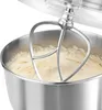 A close-up shot of a stand mixer's mixing bowl and beater, filled with a creamy batter. Produktbild-Vorschau