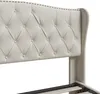 A close-up view of a tufted headboard of a bed. Náhľad obrázku produktu