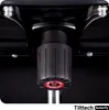Close-up view of the tilt tension adjustment mechanism on an office chair base. Voir les images du produit