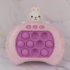 A pink electronic game with a rabbit design on top, featuring pop-it buttons. Produktbild-Vorschau