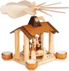 A wooden Christmas pyramid with a nativity scene and candle holders. Náhled obrázku produktu