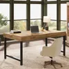 A home office setup with a wooden desk, laptop, lamp, and chair. Voir les images du produit