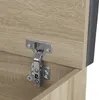 Close-up of a wooden cabinet with a metal hinge. Náhled obrázku produktu