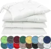 A stack of white seat cushions with a row of colored swatches below. Produktbild-Vorschau