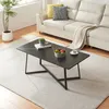 A living room scene with a sofa, coffee table, and a plant. Voir les images du produit