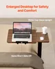 A laptop table is shown over a bed. Náhled obrázku produktu