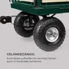 Close-up of the wheels and frame of a dark green wagon. Produktbild-Vorschau