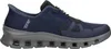 A side view of a single blue and gray athletic shoe. Voir les images du produit
