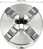 A close-up, top-down view of a four-jaw lathe chuck. Podgląd zdjęcia produktu