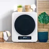 A mini-washing machine dryer is shown in a home setting, with decorative plants and baskets. Produktbild-Vorschau