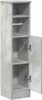 A tall, narrow cabinet with an open door, showing shelves inside. The cabinet has a concrete-like texture. Náhled obrázku produktu