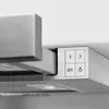 A close-up view of the control panel of a range hood. Voir les images du produit