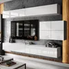 A modern living room setup featuring a wall-mounted entertainment unit with a television and storage cabinets. Produktbild-Vorschau