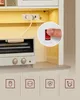 A close-up view of a kitchen cabinet with a built-in power strip and an electrical outlet, a small oven, and promotional icons at the bottom. Náhled obrázku produktu