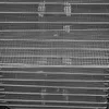 A close-up view of stacked metal drying racks. Podgląd zdjęcia produktu